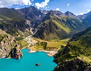 Aerial view of a glacial lake surrounded by green valleys and mountains