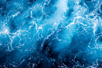 Sea surface background. Top view of vibrant foamy water. Can be used in covers, packaging, posters, textures, presentations, art and design projects. Awesome vector illustration.