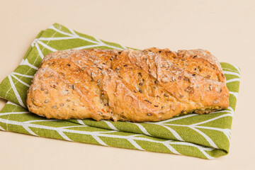 Fresh homemade crisp bread on napkin, top view. Healthy unleavened bread. French bread. Top view Bakery products