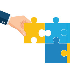 Obraz premium Hand in a suit placing the last puzzle piece.