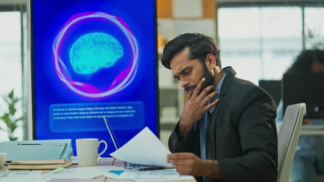 Business professional concentrates in coworking space leveraging AI powered virtual assistant and realtime big data analytics on laptop display for hyper automated workflow intelligence optimization	