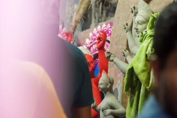 Goddess idols are being prepared with clay before festival. Idols being made for Durga Puja festival.