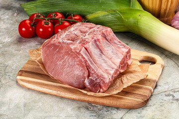 Raw pork loin cut with bone