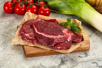 Raw beef cheeks cut for cooking