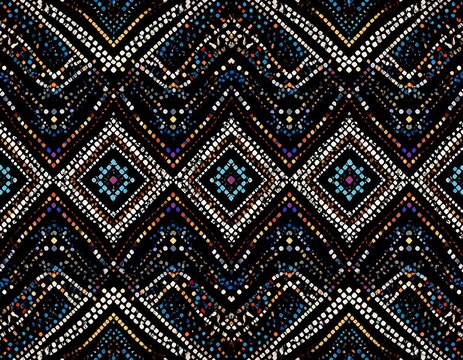 Symmetrical pattern with zigzags and diamond-shaped clusters, composed of multicolored dots on a black background