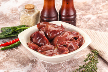 Raw uncokked chicken liver in the bowl