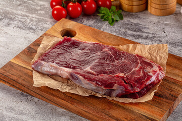 Gourmet raw rib eye steak
