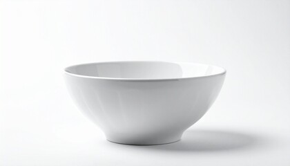 A plain white ceramic bowl with a subtle speckled pattern and smooth surface sits empty against a white background