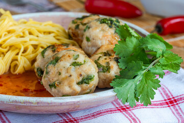 Thai-style turkey meatballs with sweet chilli sauce and egg noodles