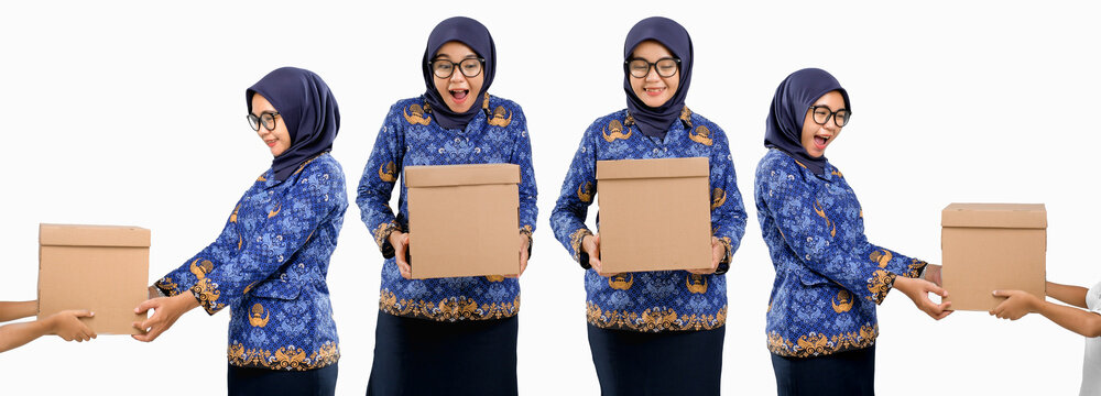 Beautiful female civil servant in Indonesian Korpri uniform receiving or giving cardboard boxes, symbolizing charity and teamwork. Ideal for ASN day, teacher day or social service concept.