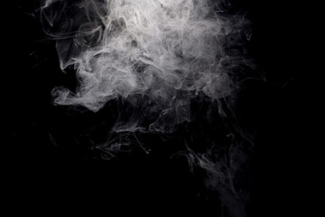 Abstract smoke rising gracefully, creating a dark and dramatic background.