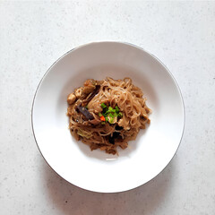 Indonesian fried noodles cooked with rice vermicelli