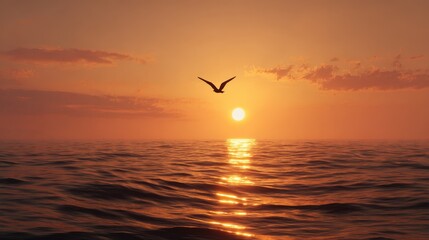 Fototapeta premium Sunset over the ocean with a solitary bird flying in the warm glow of evening light