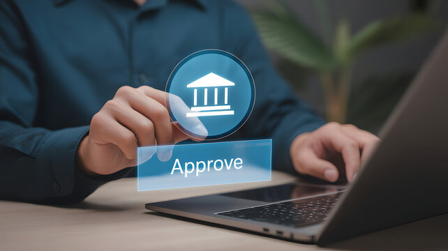 Business professional digitally approves transaction with glowing bank icon and text on screen