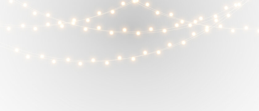 Christmas lights isolated on transparent background. Festive garland with golden bulbs for winter holiday decoration and celebration design.	
