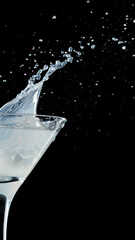 Close-up macro of white cocktail splash with sparkling droplets. Concept of detail, motion, and creativity for digital design, social media visuals, and luxury drink advertising.