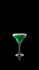 Minimal green cocktail in coupe glass on black reflective surface. Concept of calm sophistication and premium lifestyle for alcohol brands, digital design, and editorial visuals.