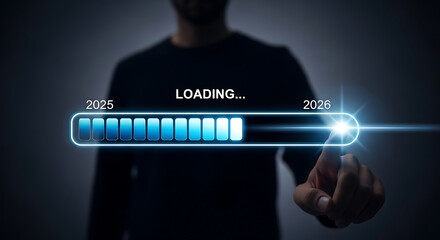 Person interacting with a glowing loading bar, symbolizing progress towards 2026.