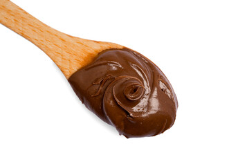 Cream chocolate with spoon on a white background