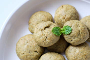 Close-up of homemade mint cookies on a white plate
