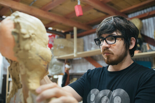 Sculptor working on a bust