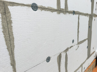 White wall insulated with polystyrene foam