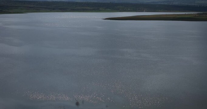 Calm and contemplative aerial drone shot over Calles Dam in San Jos&eacute; de Gracia, Aguascalientes, Mexico. The footage highlights the serene landscape and reflective waters of this Magic Town