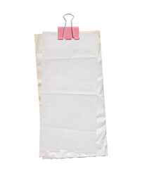 Wrinkled Stacked Paper Receipt with Pink Binder Clip Isolated