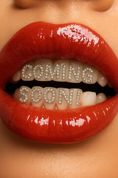 Glossy red lips reveal jeweled letters spelling coming soon across bright teeth in a bold beauty closeup designed for launch announcements teaser campaigns anticipation and glamorous promotion