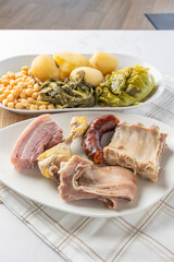 Cocido, spanish stew with meat, vegetables, and chickpeas