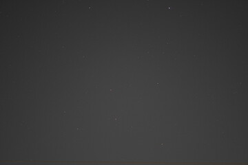 Deep Blue Galaxy Sky with Bright Stars