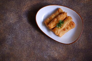 top view of fried sosis solo in a plate 