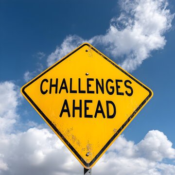 Challenges Ahead Yellow Road Sign