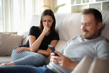 Sad woman and her partner ignoring her or being disloyal