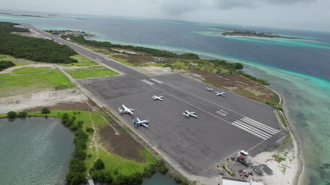 Aerial view of Los Roques airport, serene tropical island setting