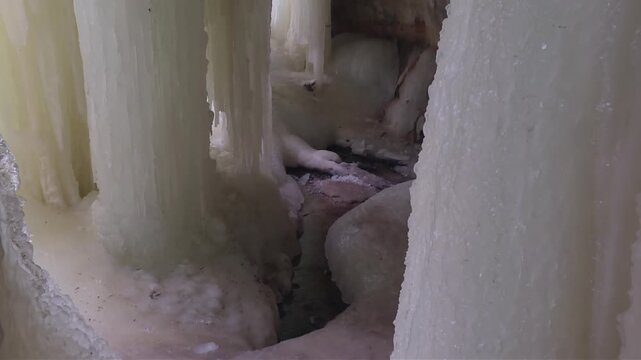 Scenic Frozen Formations At Rock River Canyon Ice Caves In Michigan's Upper Peninsula. Zoom In Shot