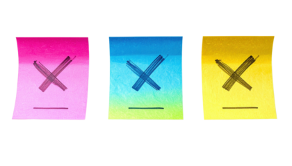 Three colorful sticky notes with marked crosses, showcasing vibrant colors and distinct designs.
