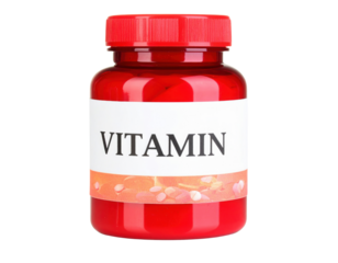 A red bottle of vitamins featuring a prominent label with the word "VITAMIN" displayed clearly.