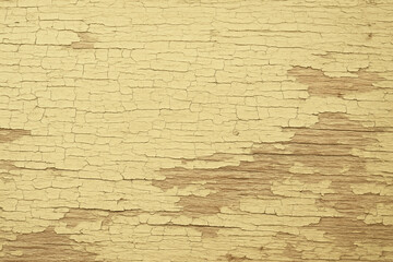 Obraz premium Weathered wood background with cracked pastel yellow paint texture and aged rustic surface