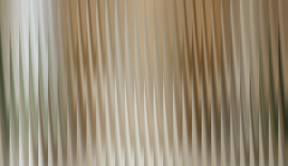 Obraz premium Abstract vertical lines in neutral earthy tones, creating a sense of pattern and texture. The lines have a blurred, soft appearance, evoking a feeling of calm and simplicity