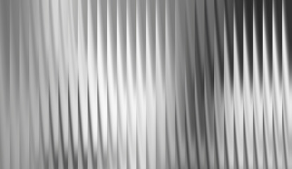 Abstract pattern of vertical lines in shades of gray, creating a sense of movement and depth. The image evokes a minimalist aesthetic with its clean lines and simple composition