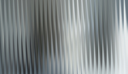 Abstract vertical lines in shades of gray. The image evokes a sense of depth and fluidity © Colors of N