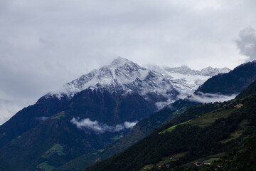 Dangerous looking snowcapped mountain summit Cima di Tel (Zielspitze) on a cloudy day in autumn in South Tyrol, Italy