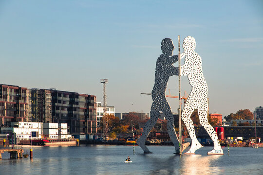 Berlin, Germany - October 20, 2025: Molecule Man Sculpture on Spree river. Iconic 30m steel sculpture by Jonathan Borofsky (1999) in Berlin; Germany, uniting East and West Germany