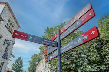 Red and Gray Tourist Directional Signpost in Medieval Old Town, Vitoria-Gasteiz, Spain. Urban Detail
