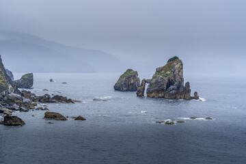 Coastal Rock Formations on Misty Basque Coast in Bay of Biscay, Vizcaya, Spain, Cliff Coastline