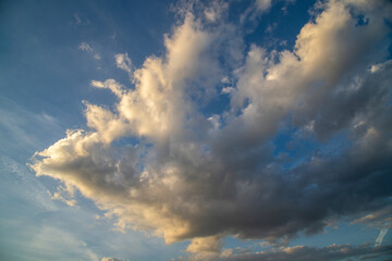 Dramatic sunset clouds with creature-like shapes, mythical creature at sunset, sunrise
