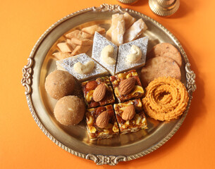 Indian Festival Diwali snacks called Faral like Laddu Chakli, Kajukatli, shankarpale etc 