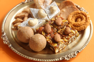 Indian Festival Diwali snacks called Faral like Laddu Chakli, Kajukatli, shankarpale etc 