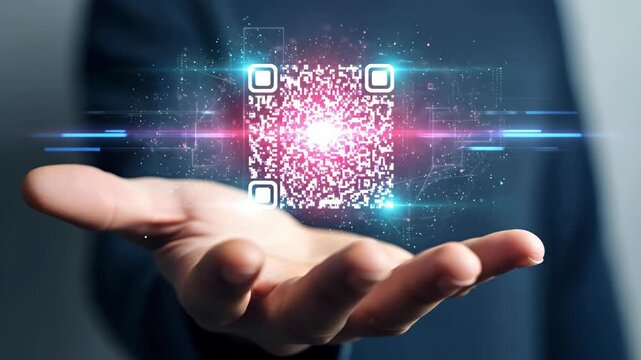 Man holding glowing QR code in hand for digital payment and innovative scan technology animation